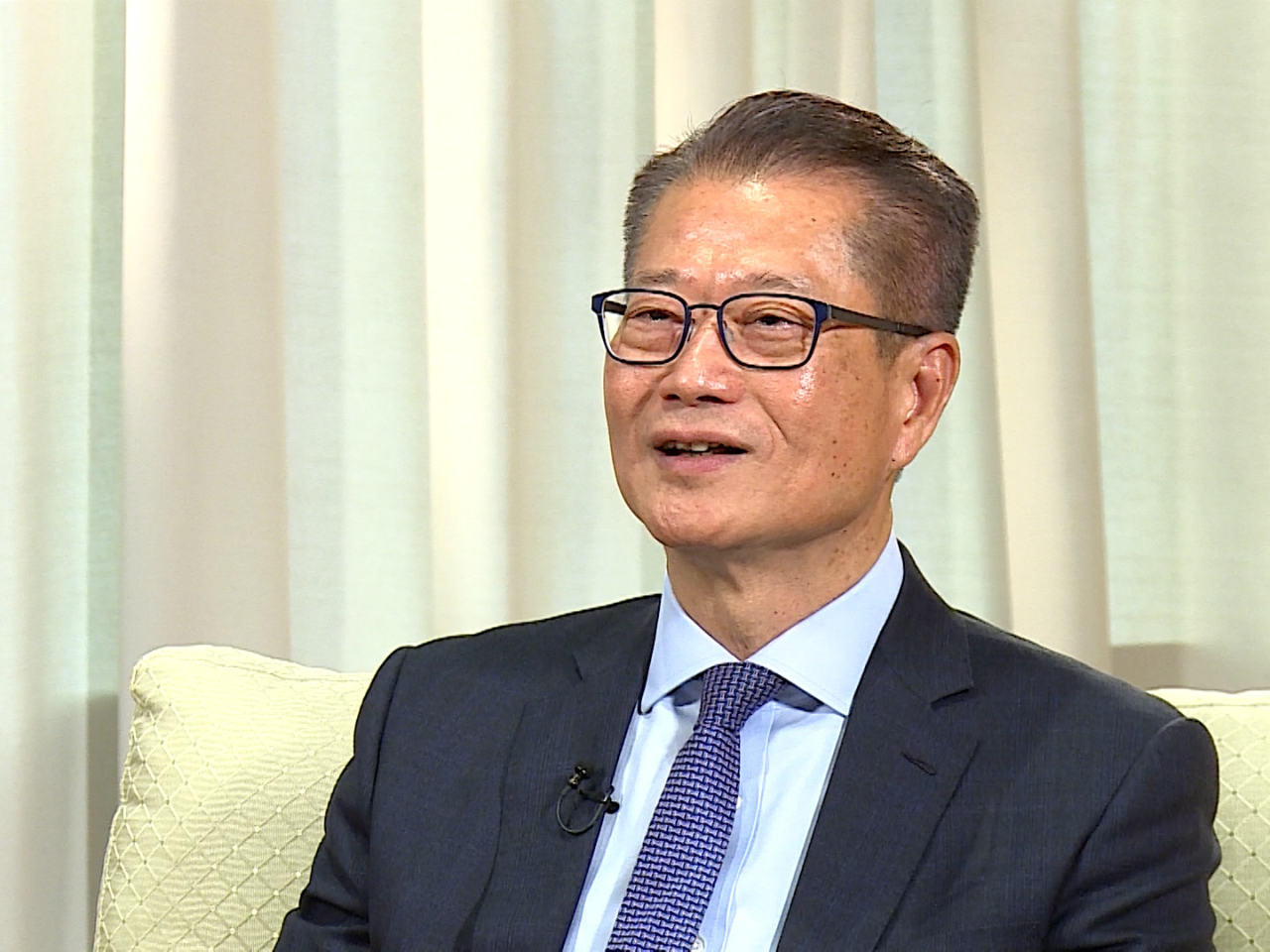 Financial Secretary Paul Chan says he's cautiously optimistic about the city's second-half economic outlook. Photo: RTHK