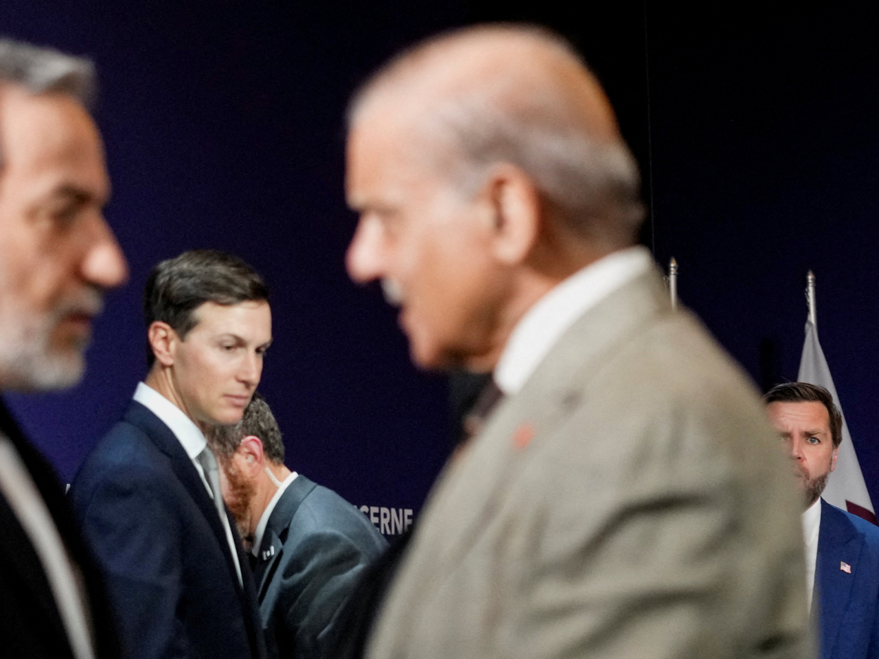 US Vice President JD Vance looks on next to US President Donald Trump's son-in-law Jared Kushner, as Iran's Foreign Minister Abbas Araqchi shakes hands with Pakistan's Prime Minister Shehbaz Sharif. Photo: Reuters