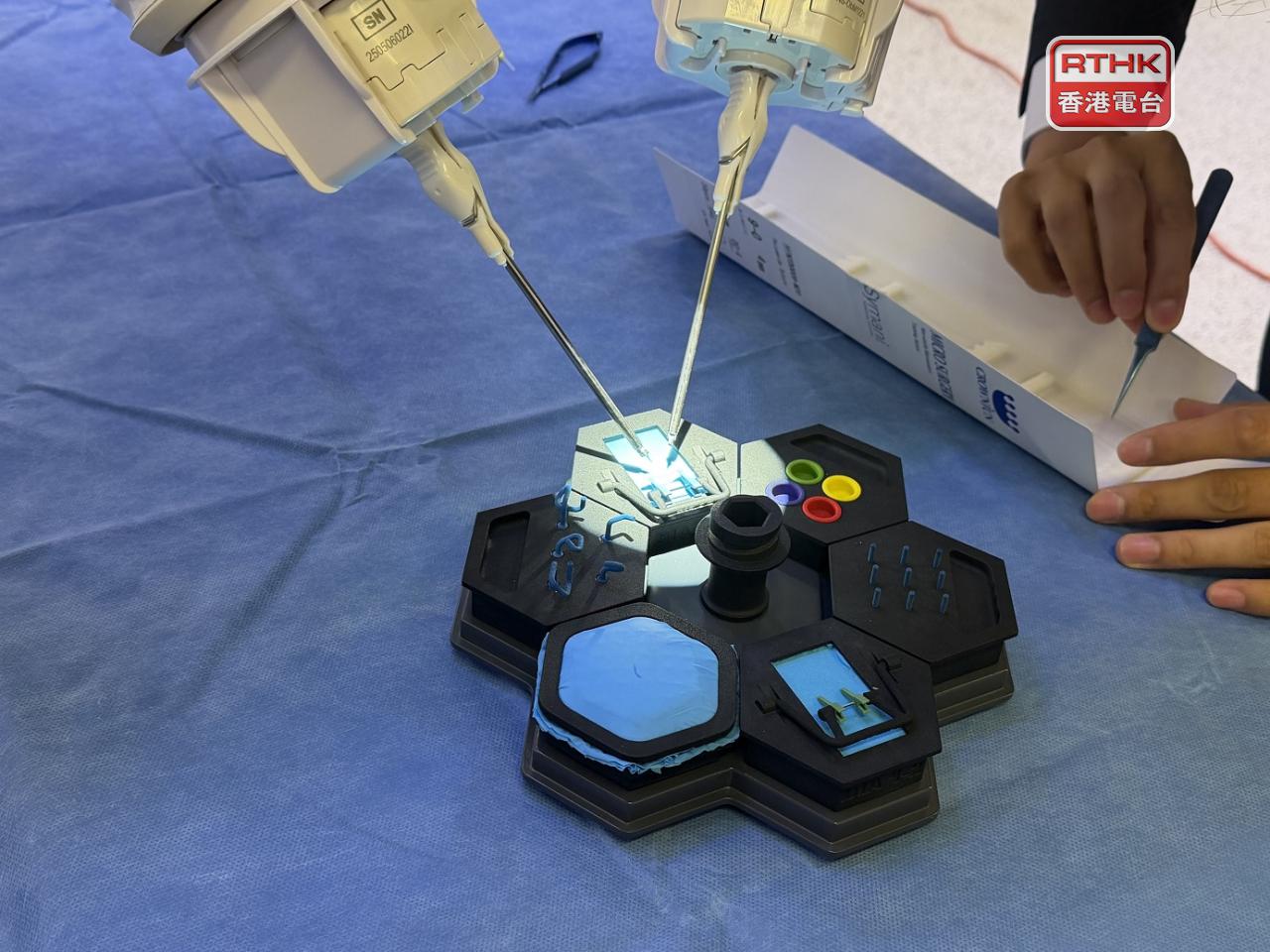University of Hong Kong surgeons says the robotic assistant helps to reduce fatigue during long operations. Photo: RTHK