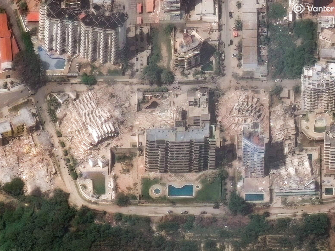A satellite view shows collapsed apartment buildings in La Guaira. Photo: Reuters
