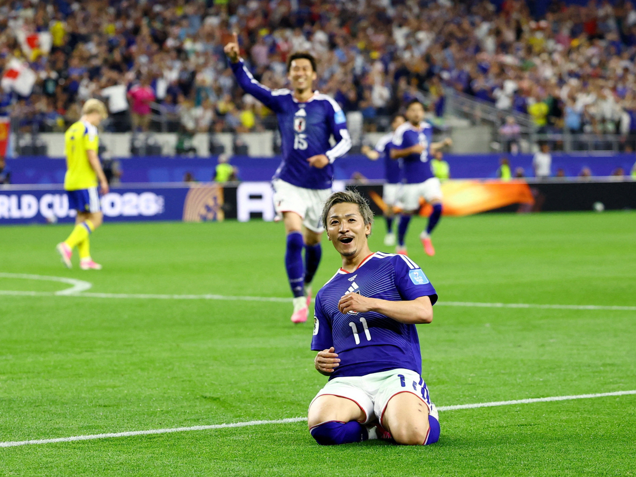 Daizen Maeda fired Japan ahead early in the second half. Photo: Reuters