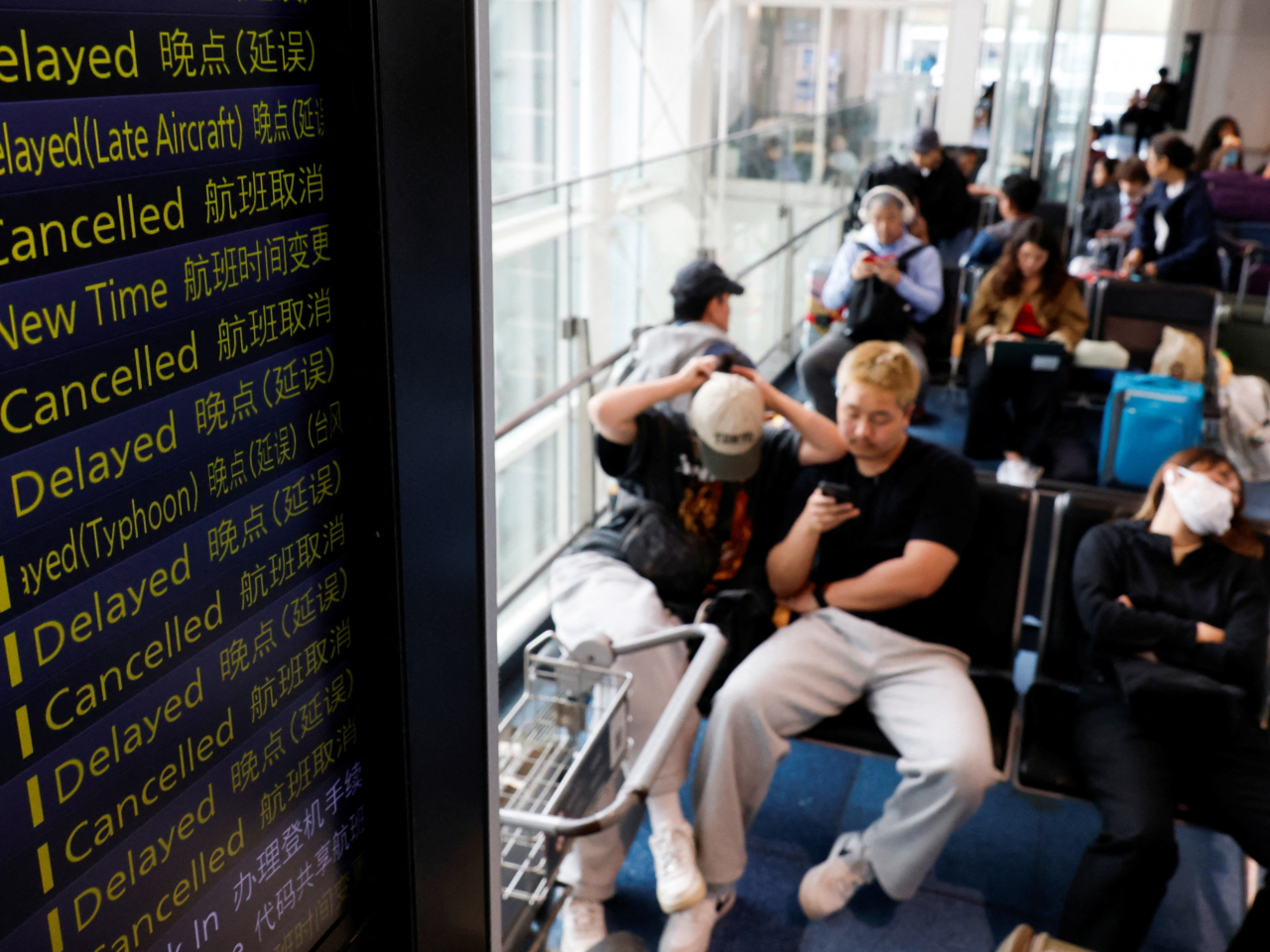 Passengers are stranded at Haneda Airport in Tokyo. Photo: Reuters