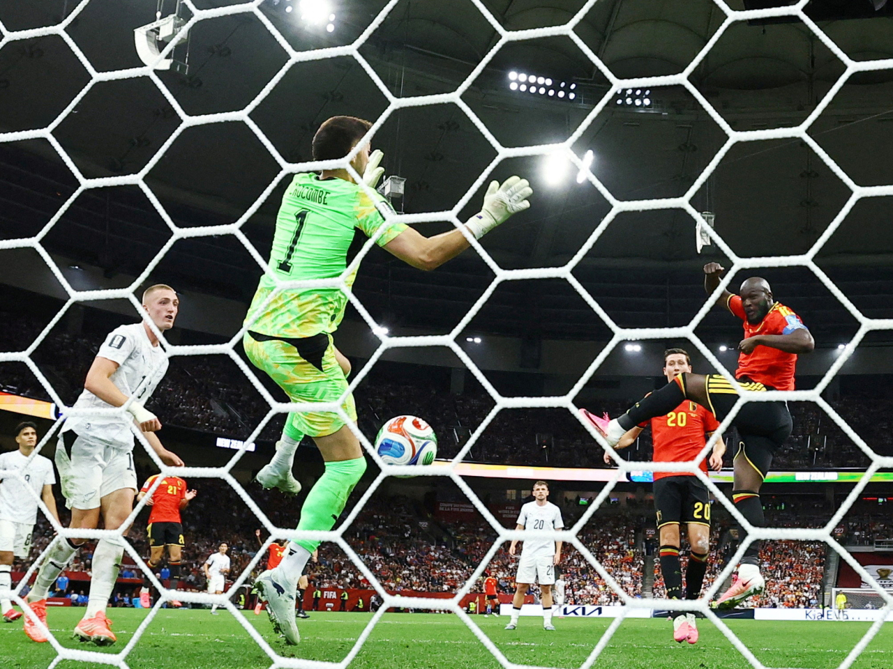 Romelu Lukaku scores Belgium's fourth goal to send the Red Devils to the top of the group in Vancouver. Photo: Reuters