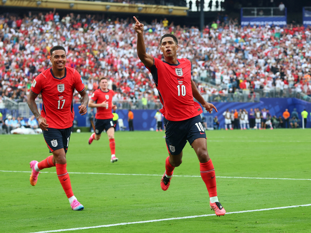 England's Jude Bellingham celebrates scoring their first goal with Morgan Rogers. Photo: Reuters