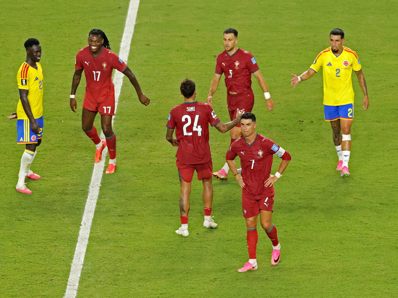 Colombian and Portuguese players shake hands after it ended all square between them. Photo: Reuters