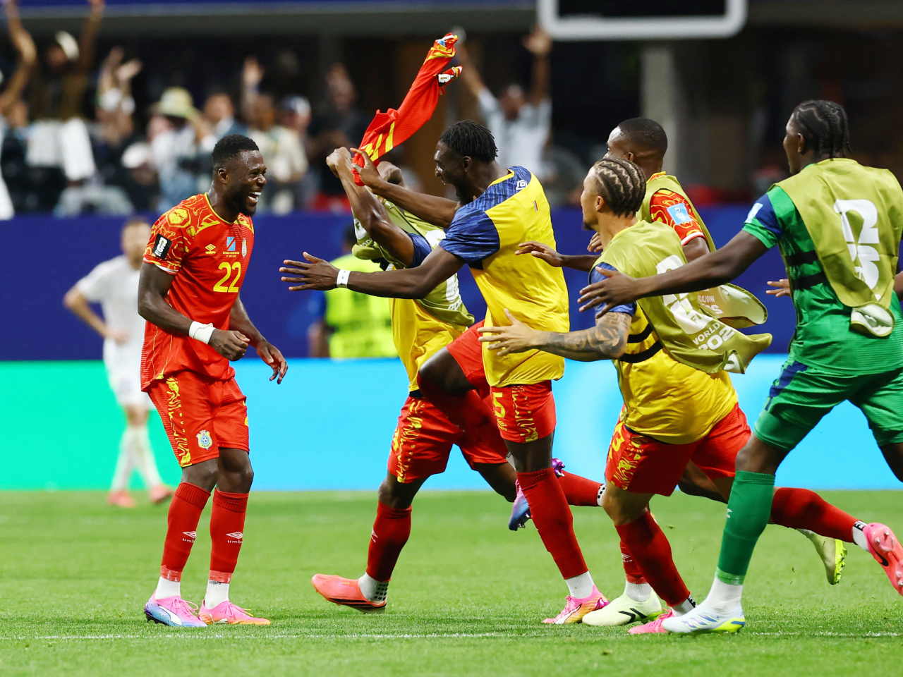 DR Congo players celebrate reaching the World Cup knockout round for the first time in their history. Photo: Reuters