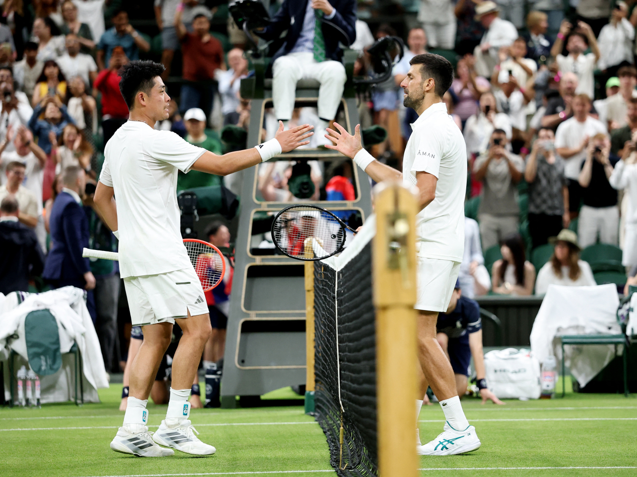 24-time Grand Slam winner Novak Djokovic held off a spirited Wu Yibing to advance. Photo: Reuters