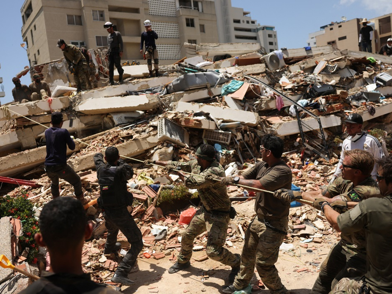 Although search and rescue efforts continue, the United Nations estimates 50,000 people are still missing. Photo: Reuters