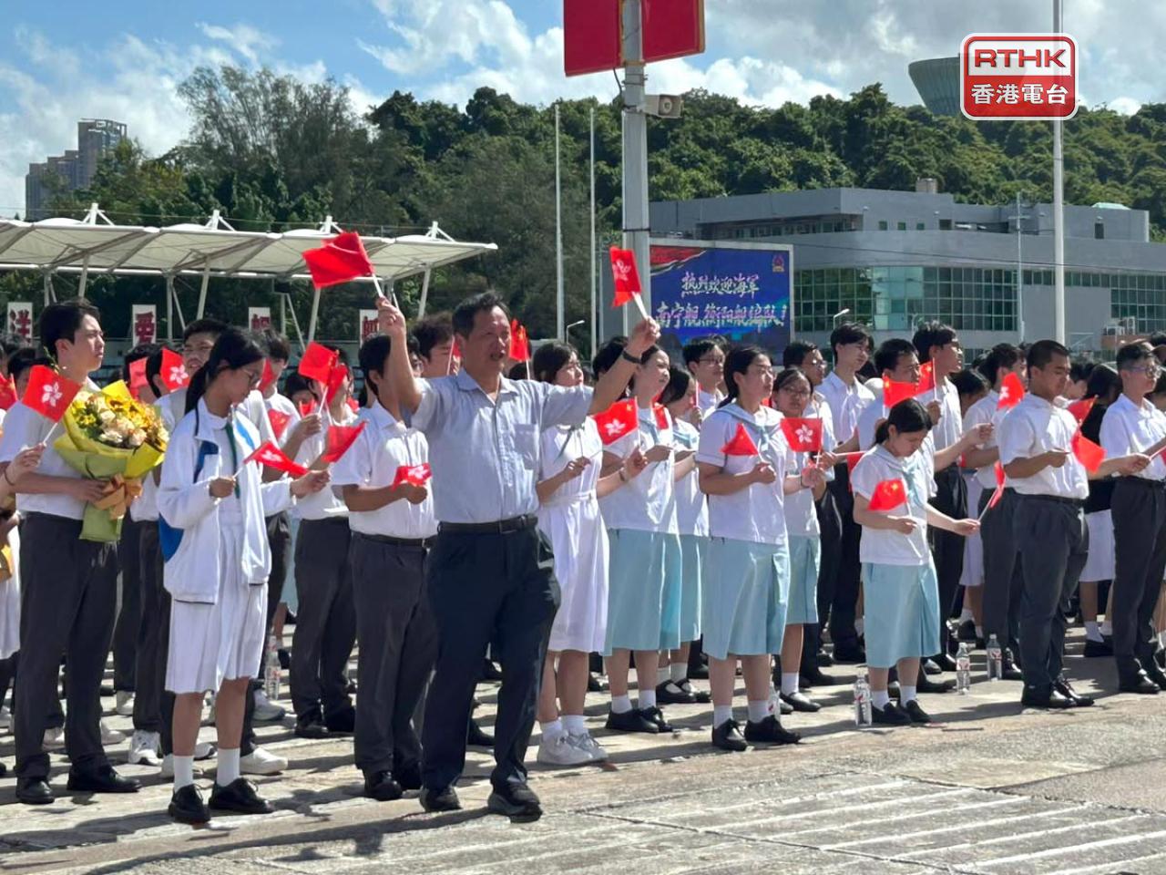 Students at the welcome ceremony for the two visiting PLA vessels. Photo: RTHK