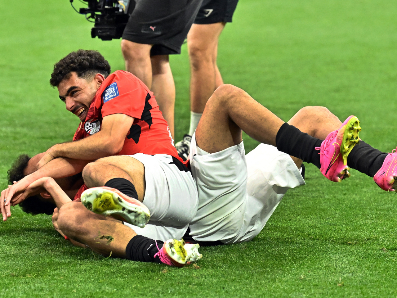 Egypt players celebrate after the match as Egypt qualify for the Round of 16 stage of the World Cup. Photo: Reuters