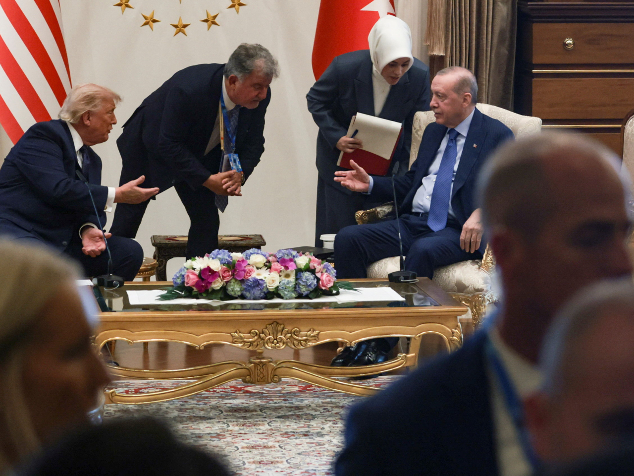 Donald Trump and Tayyip Erdogan speak with their translators during a bilateral meeting ahead of a Nato summit. Photo: Reuters