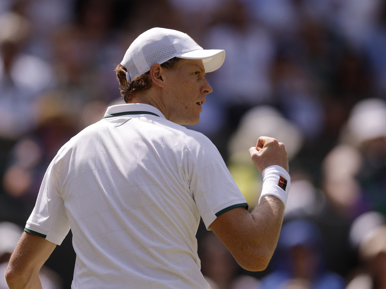 World number one Jannik Sinner made light work of Jan-Lennard Struff in straight sets to advance. Photo: Reuters