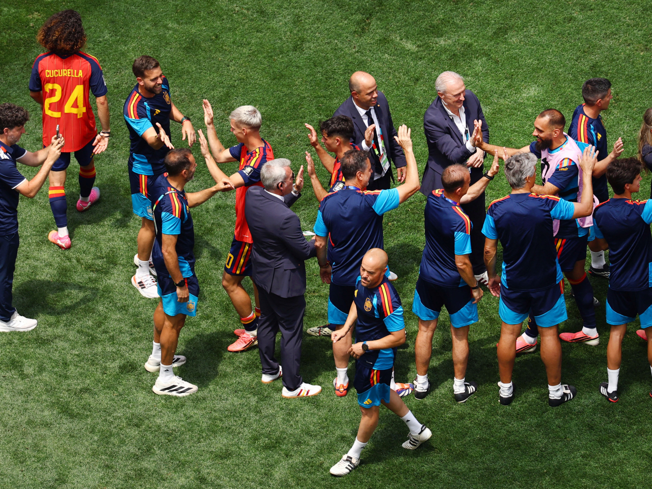 Spanish players and coaching staff celebrate qualifying for the World Cup semi finals. Photo: Reuters
