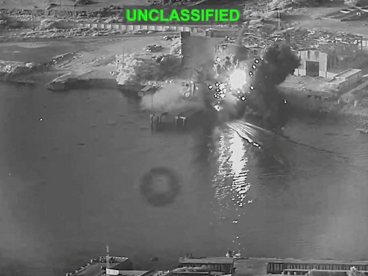 Smoke rises after a US sea surface drone reached its target, a submarine and ship maintenance facility in Bandar Abbas. Photo: US Central Command via Reuters