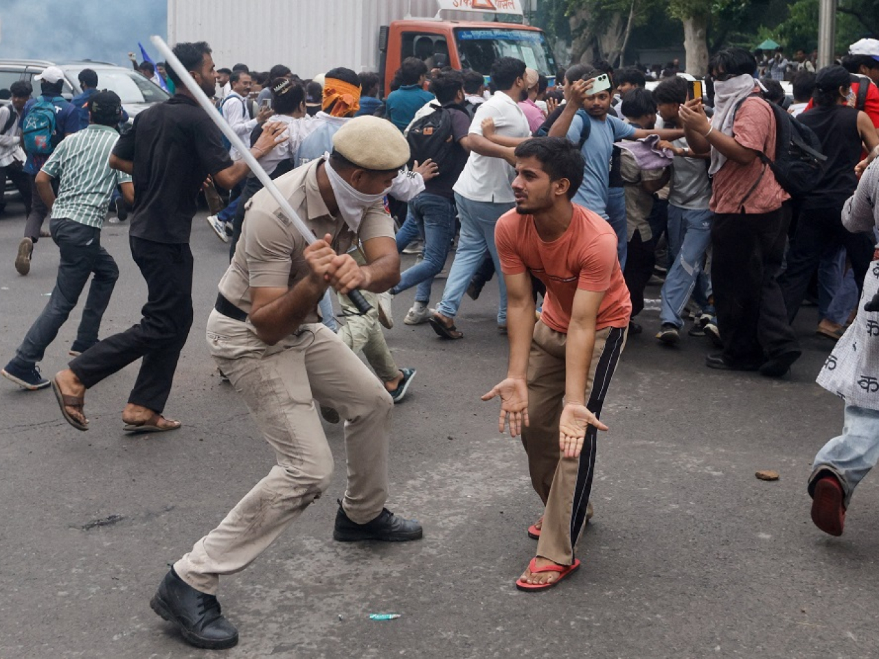 Police in New Delhi used tear gas and sticks to try and disperse the protesters. Photo: Reuters