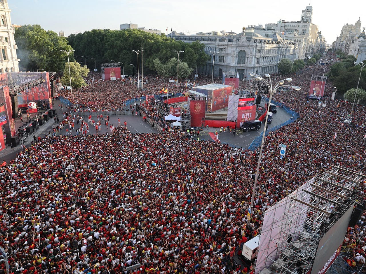 Fans gather at Cibeles Square in Madrid as they wait for the bus carrying the new world champions. Photo: Reuters