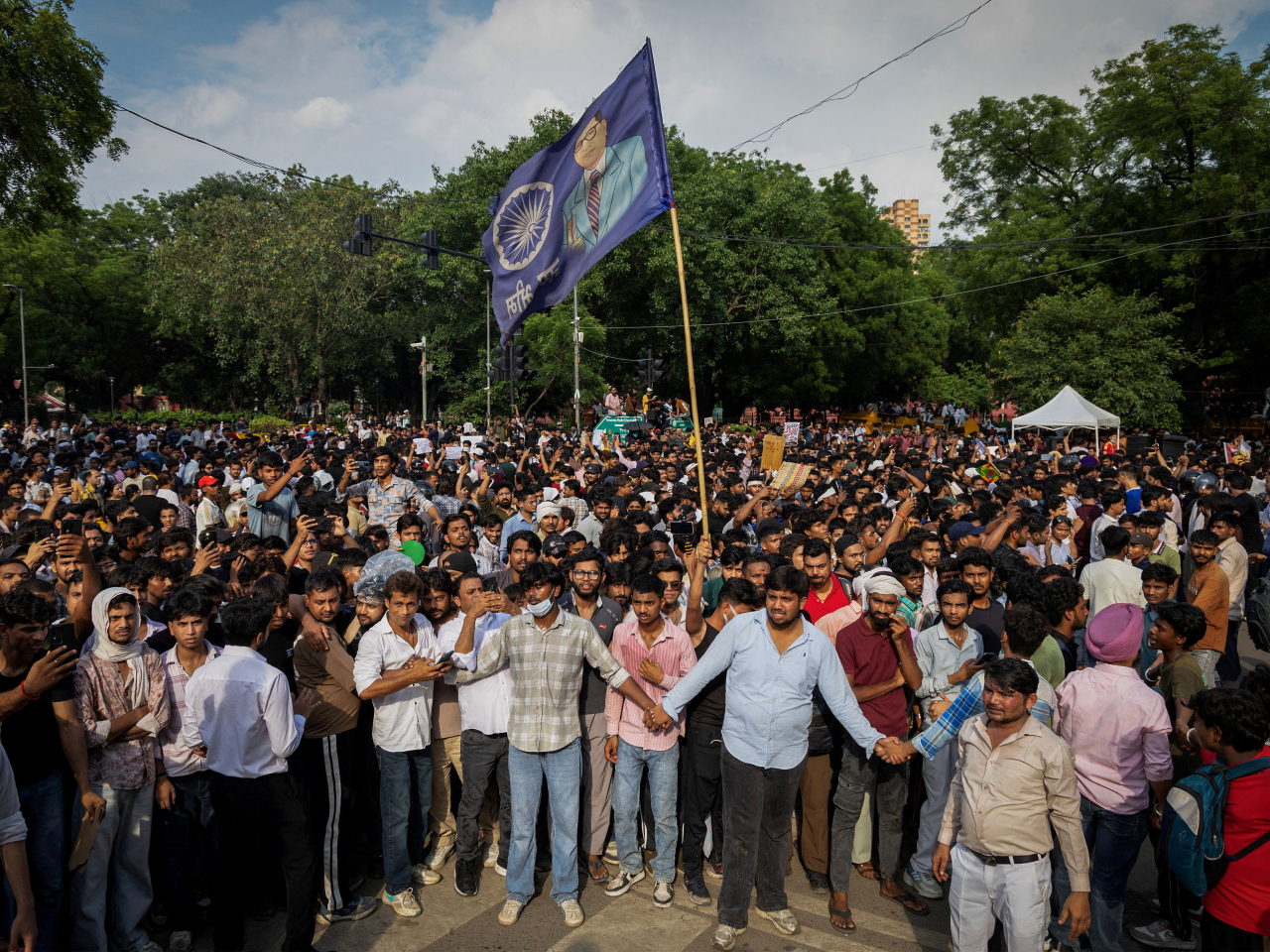 Activists demand the resignation of Education Minister Dharmendra Pradhan in New Delhi. Photo: Reuters