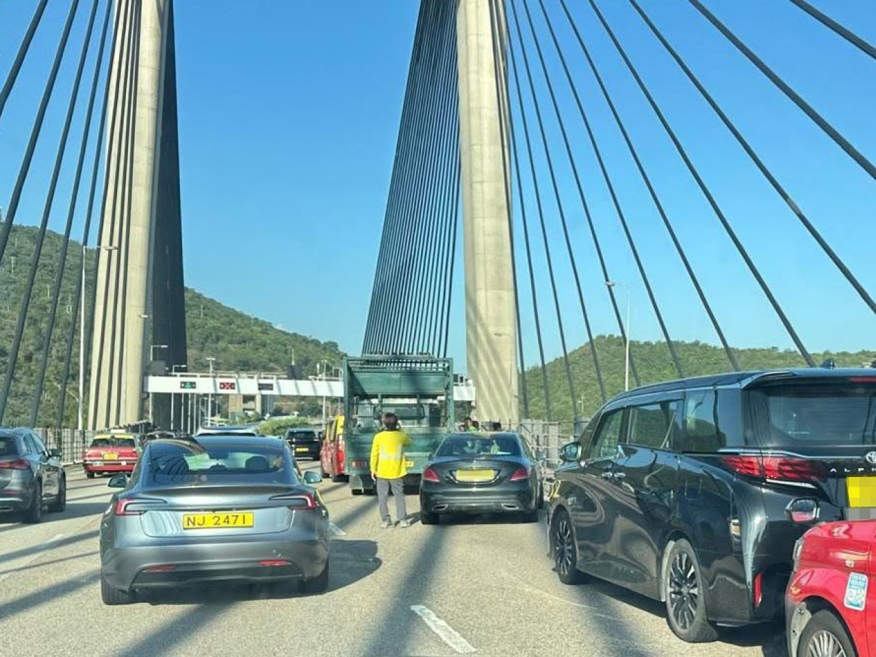 Online photos show snarled up traffic on the airport-bound lanes of Lantau Link.