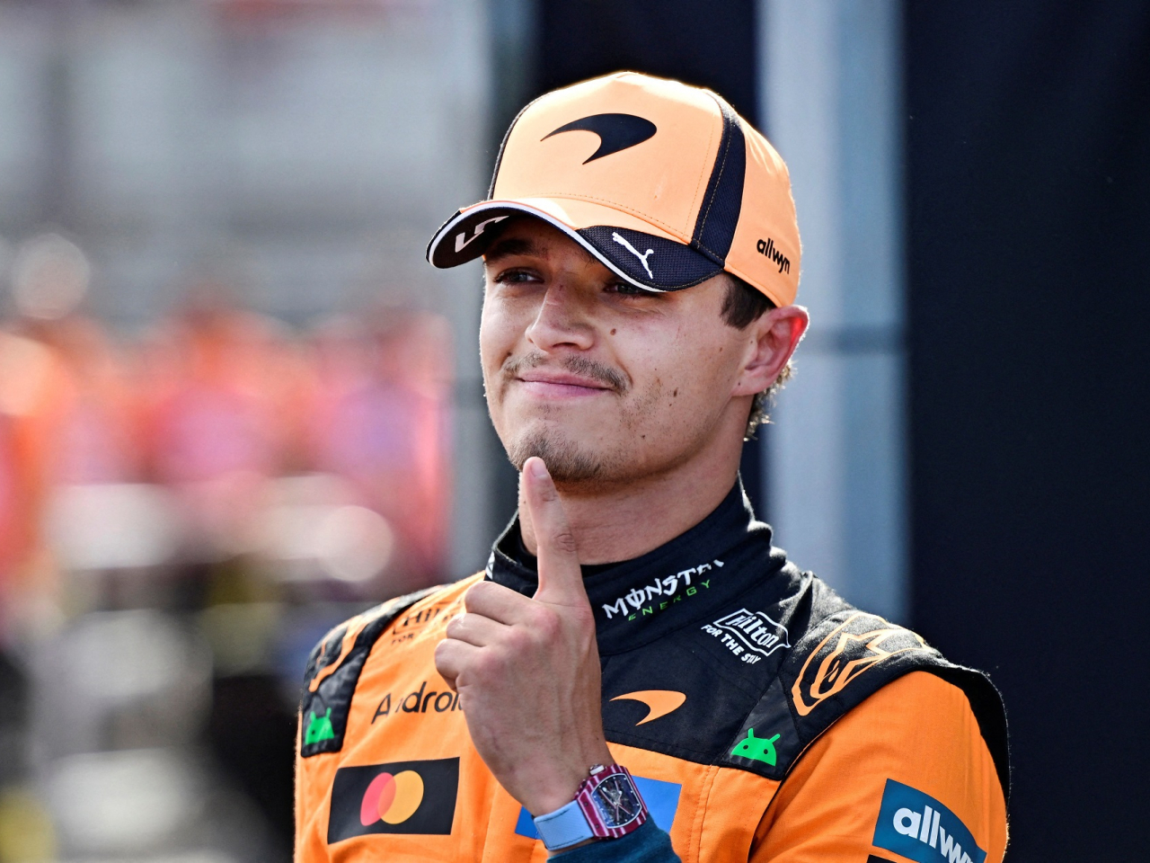 McLaren's Lando Norris celebrates after qualifying in pole position. Photo: Reuters