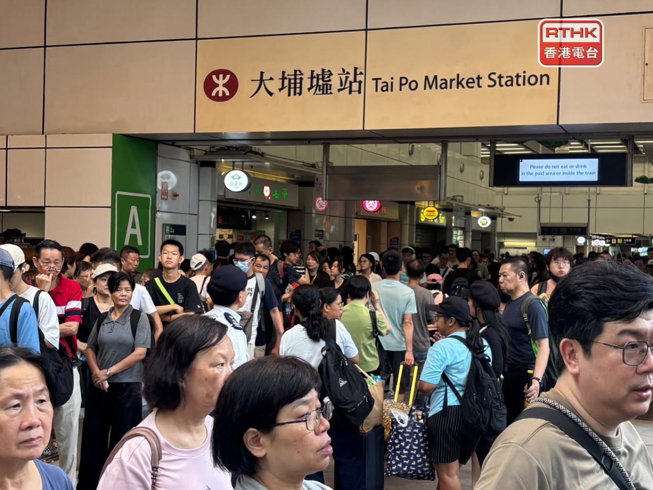Tai Po Market Station is packed with people as train services resume. Photo: RTHK