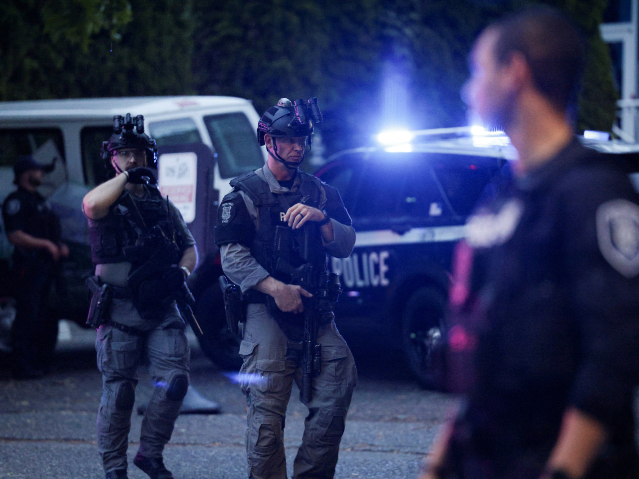 Police officers guard an area after Seattle Police responded to what they described as a shooting with "multiple" victims at Seattle Centre. Photo: Reuters