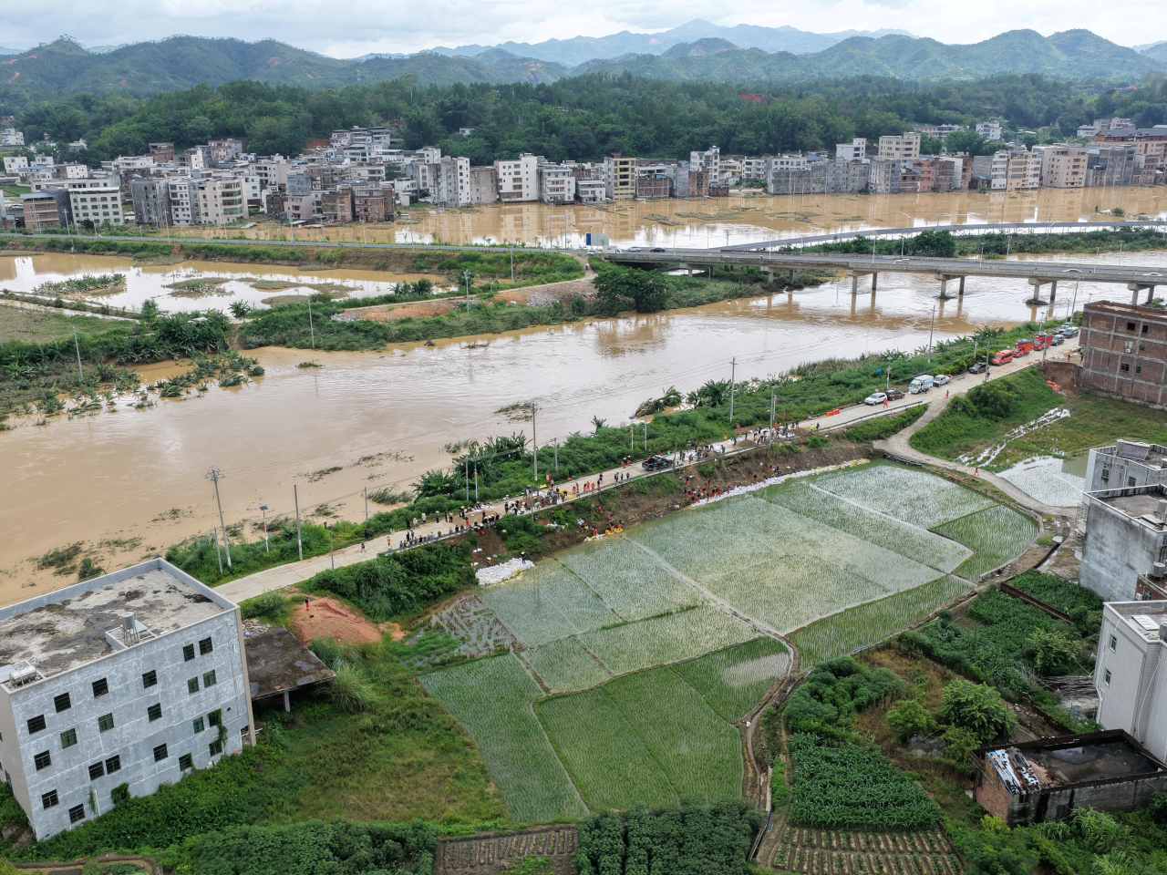 Villages in Wuhua county, Meizhou city, Guangdong, are inundated by floodwaters in the wake of Typhoon Noul. Photo: cnsphoto/Reuters