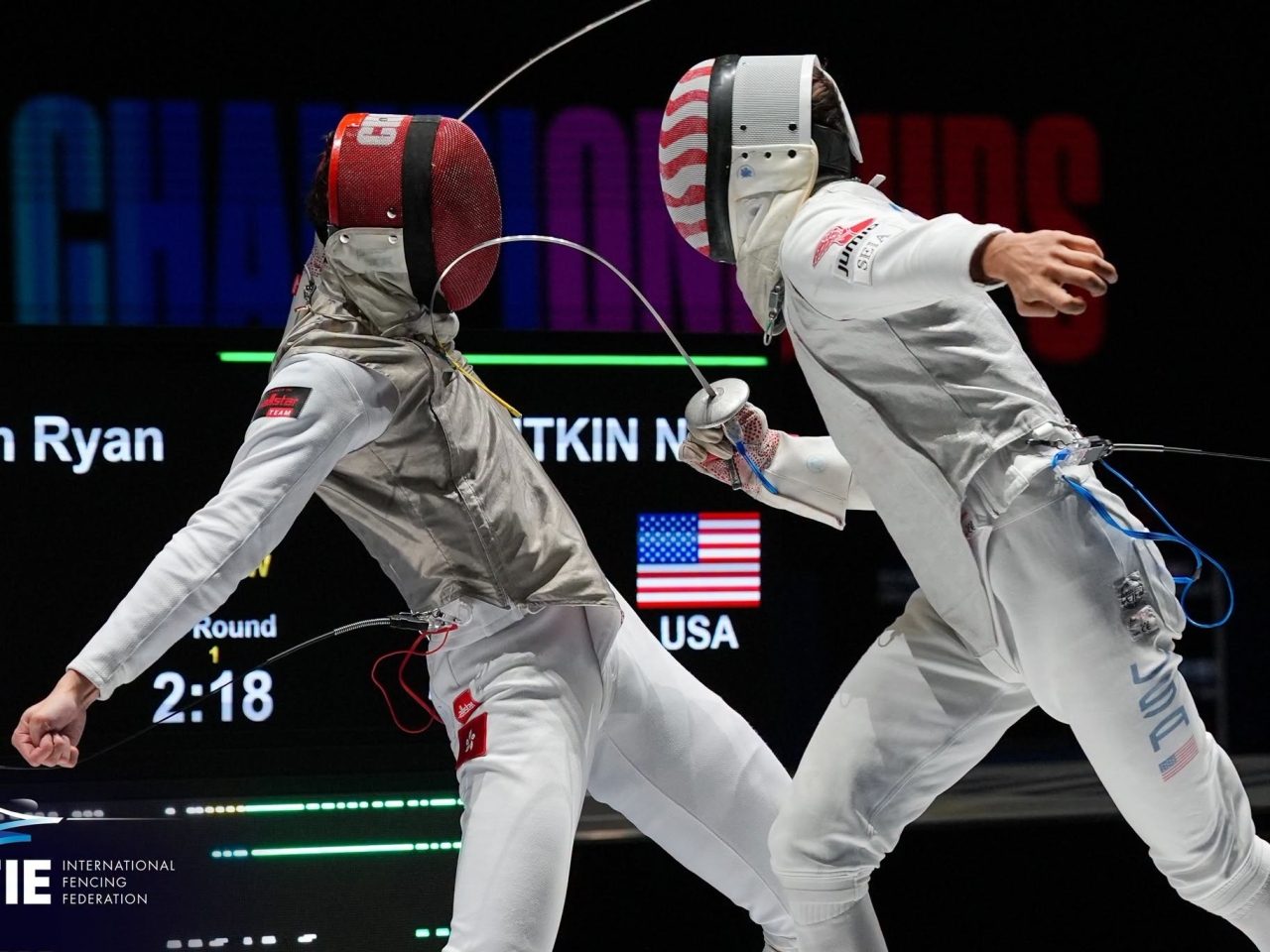 Ryan Choi, left, in action for the SAR against the United States in the semi-final. Photo courtesy of the International Fencing Federation
