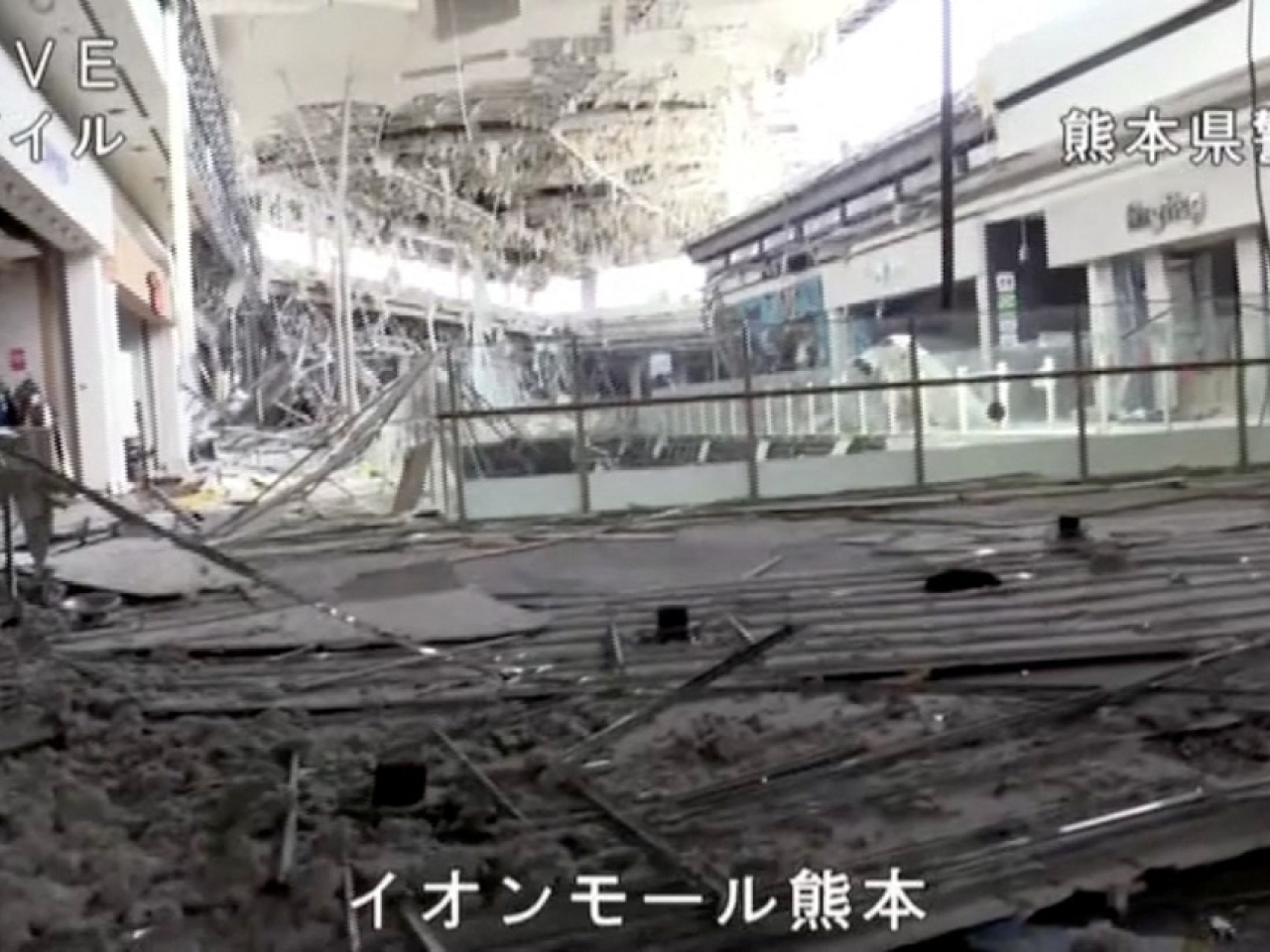 Police bodycam footage shows debris in the interior of the Aeon shopping centre. Screengrab: Japan's National Police Agency via Reuters
