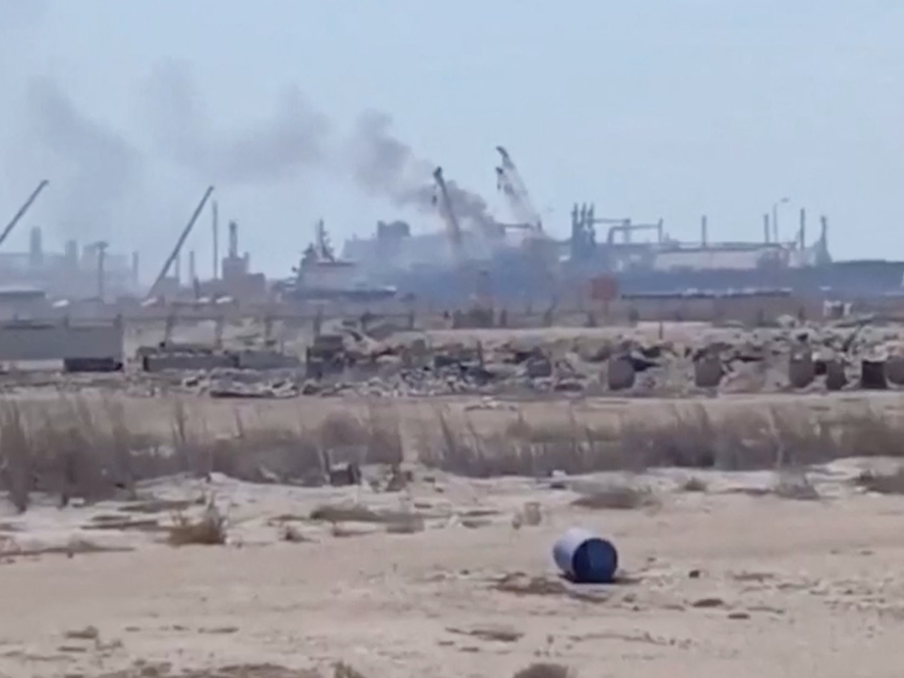 Smoke rises from a gas tanker after what maritime security firm Ambrey said was a drone strike at Damietta port in Egypt. Screengrab: social media video via Reuters