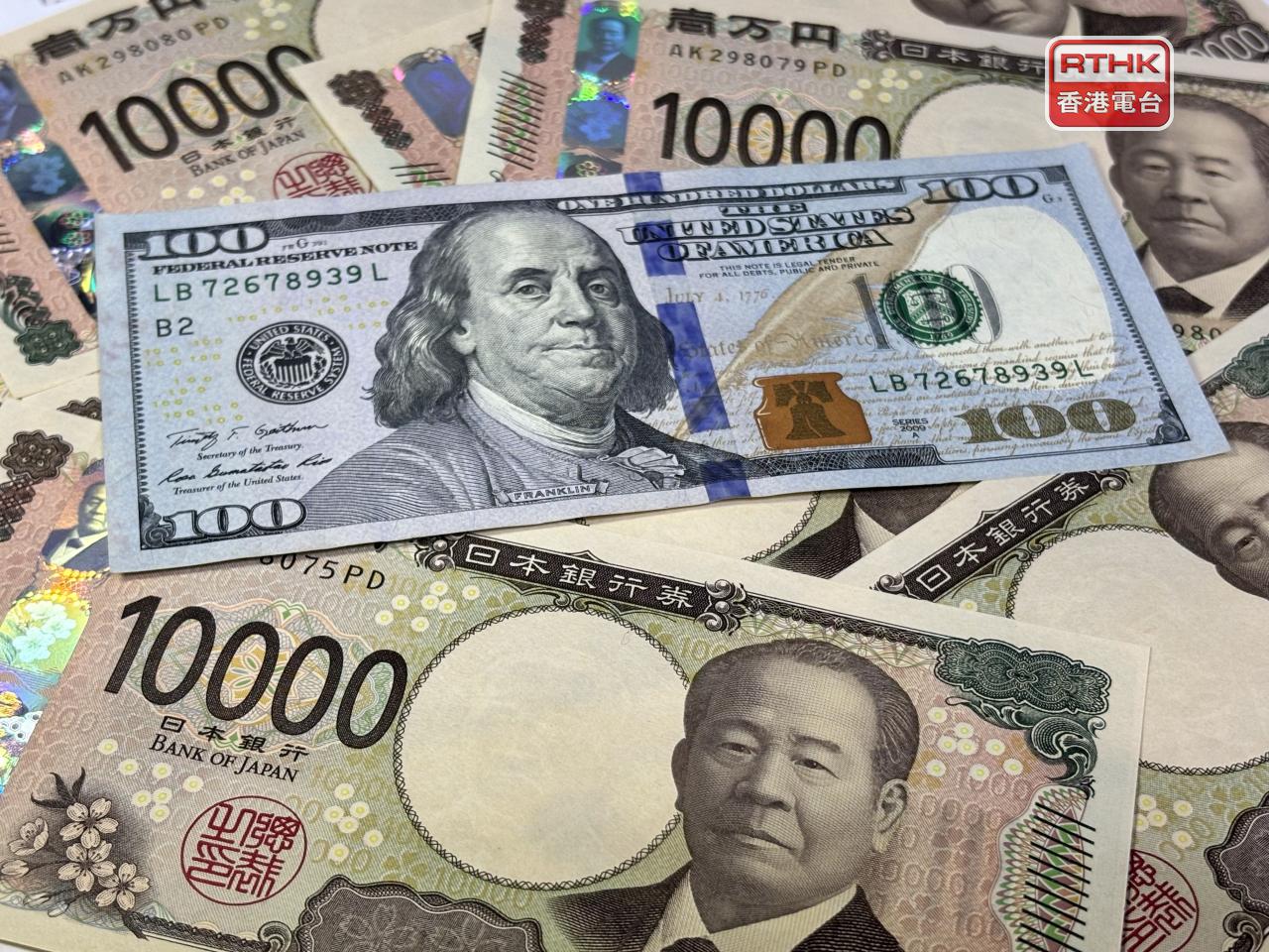 美元兌日圓跌逾1%，美元自日內高位160.87日圓，急挫至157.6日圓。（港台圖片）