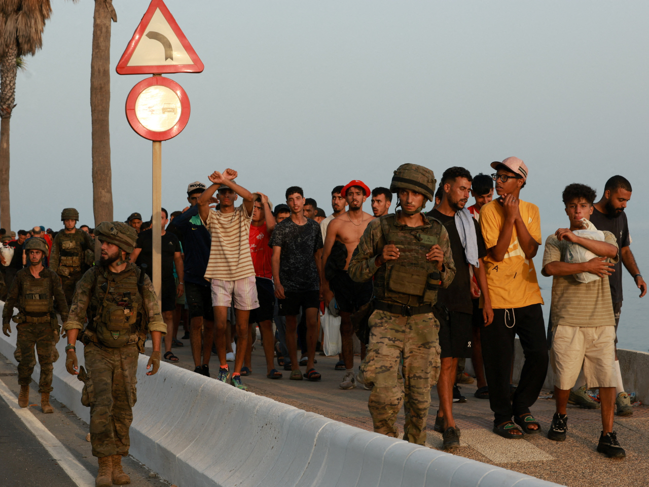 Most of the estimated 60,000 people who rushed into Spain's north African territory have returned to Morocco. Photo: Reuters