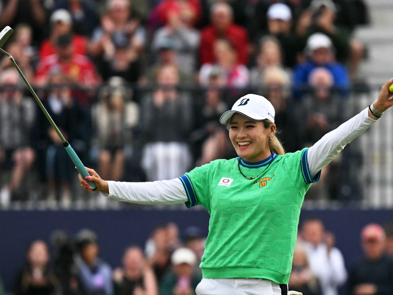 Shiho Kuwaki celebrates her victory on the 18th green after a second playoff round on the final day of the British Open. Photo: AFP
