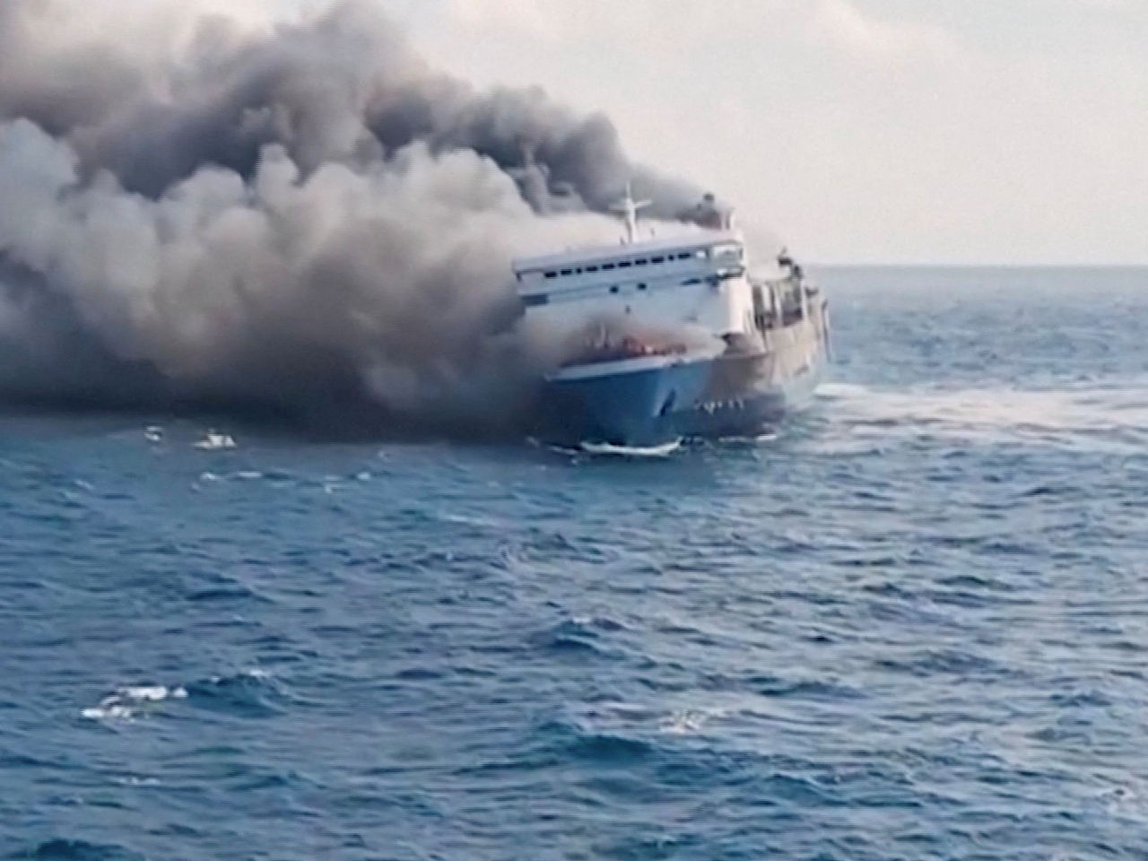 Smoke pours from an inter-island ferry off the coast of Madura in Indonesia. Photo Reuters