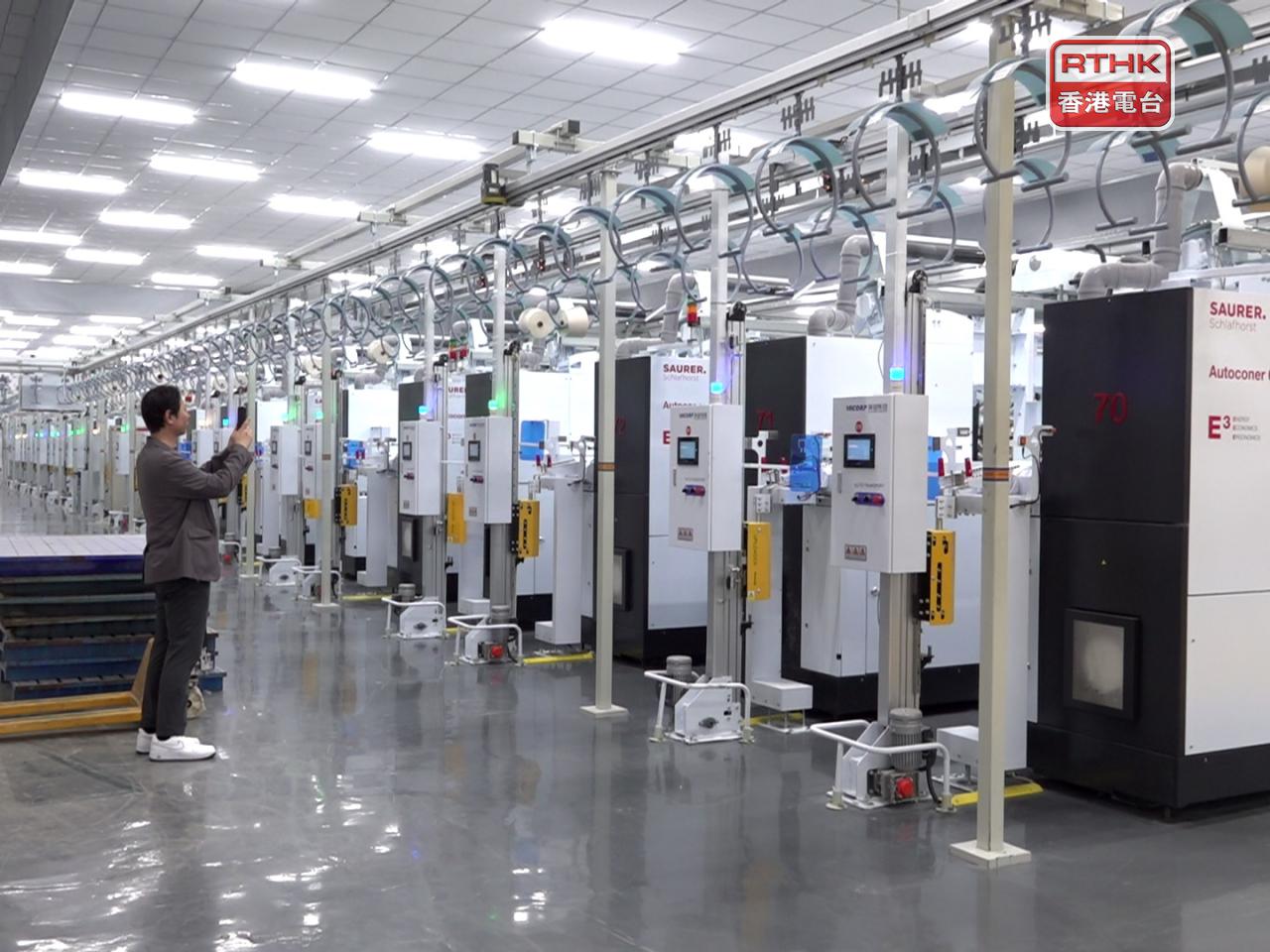 Instead of manning the production line, workers stationed at the cotton processing factory are responsible for daily maintenance and the upkeep of machines. Photo: RTHK