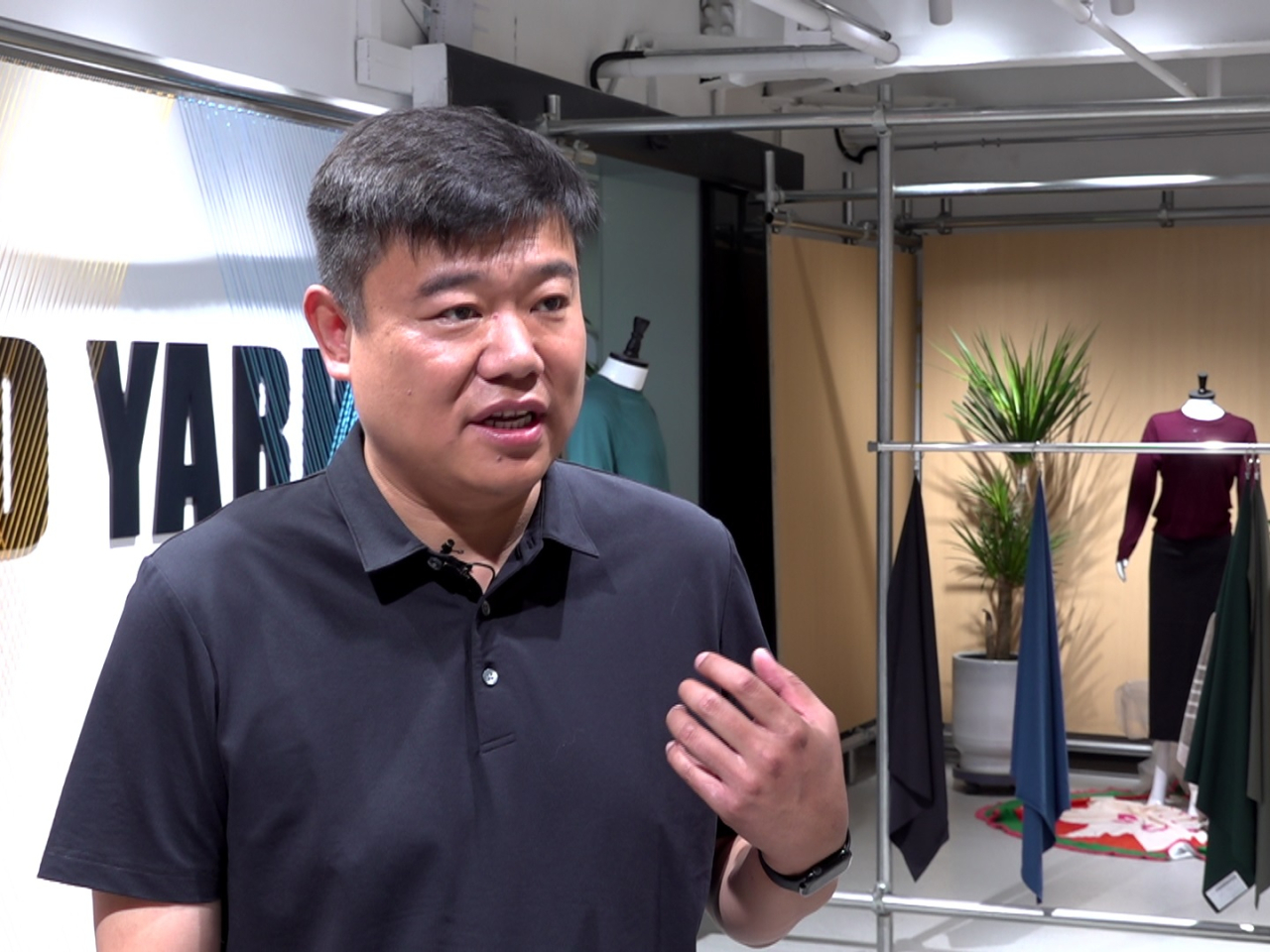 Liu Zhen says garment dyeing inevitably creates pollution, so he felt there was a need to mitigate the environmental impact as much as possible. Photo: RTHK