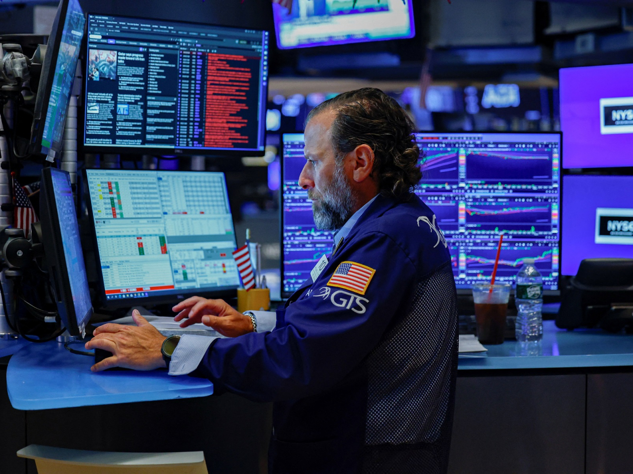 Upbeat forecasts from Caterpillar and other companies pushed US stock indices to record highs as oil eased on hopes of a Mideast peace deal. Photo: Reuters