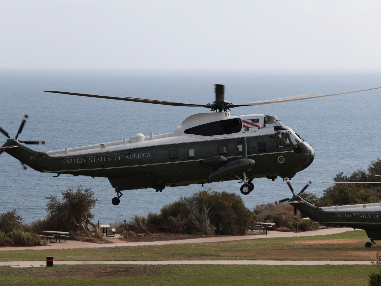 Marine One carrying US President Donald Trump arrives at the Trump National Golf Club near Los Angeles, California. Photo: Reuters