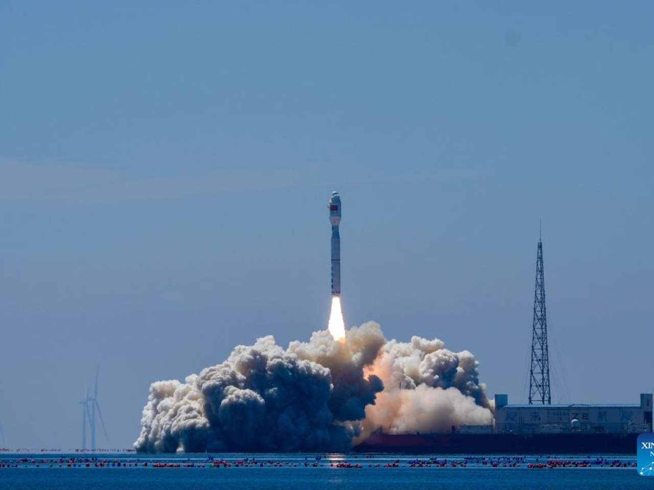 A Smart Dragon-3 carrier rocket blasts off from the sea near the city of Haiyang. Photo: Xinhua