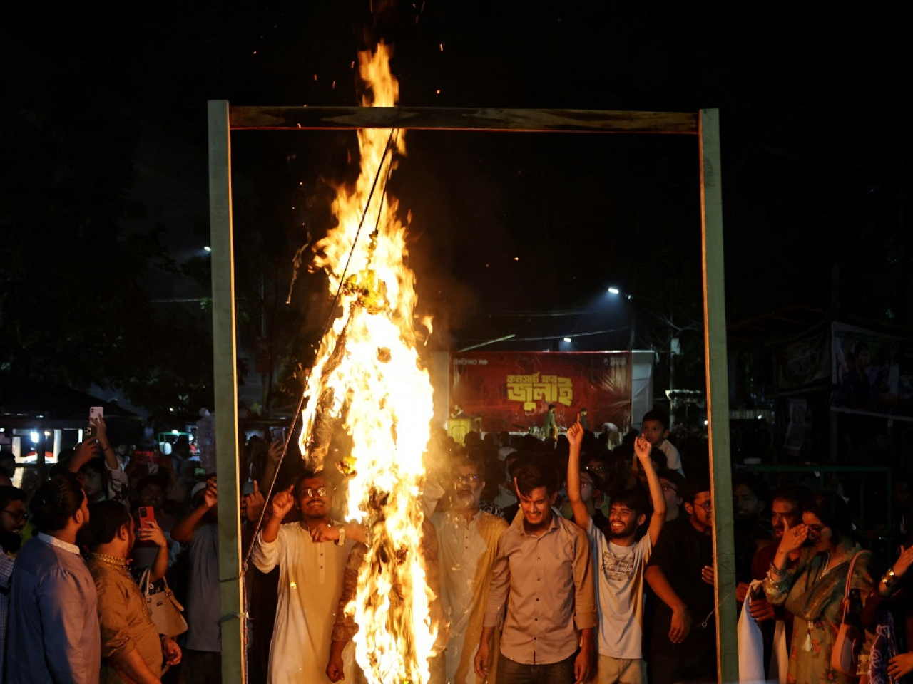 The speech prompted protesters in Dhaka to burn an effigy of Hasina. Photo: Reuters