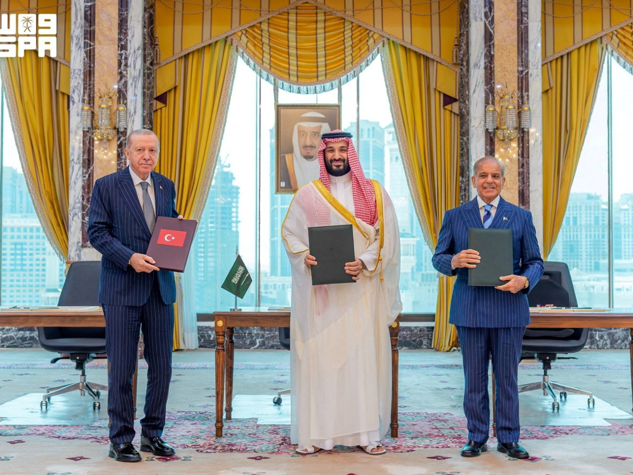 From left, Turkish President Recep Tayyip Erdogan, Saudi Crown Prince Mohammed bin Salman and Pakistani Prime Minister Shehbaz Sharif join the signing ceremony. Photo: Reuters