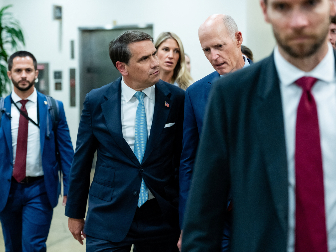 Todd Blanche listens to Rick Scott while lobbying senators to approve his nomination to be the attorney general. Photo: Reuters
