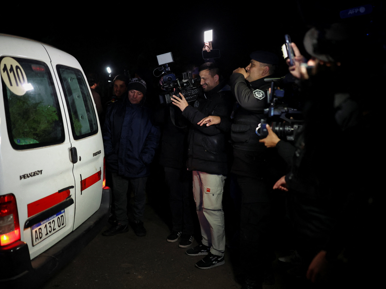 The media films a wreath arriving at El Prado Cemetery where the remains of Jorge Messi, father of footballer Lionel Messi, are expected to be transferred. Photo: Reuters