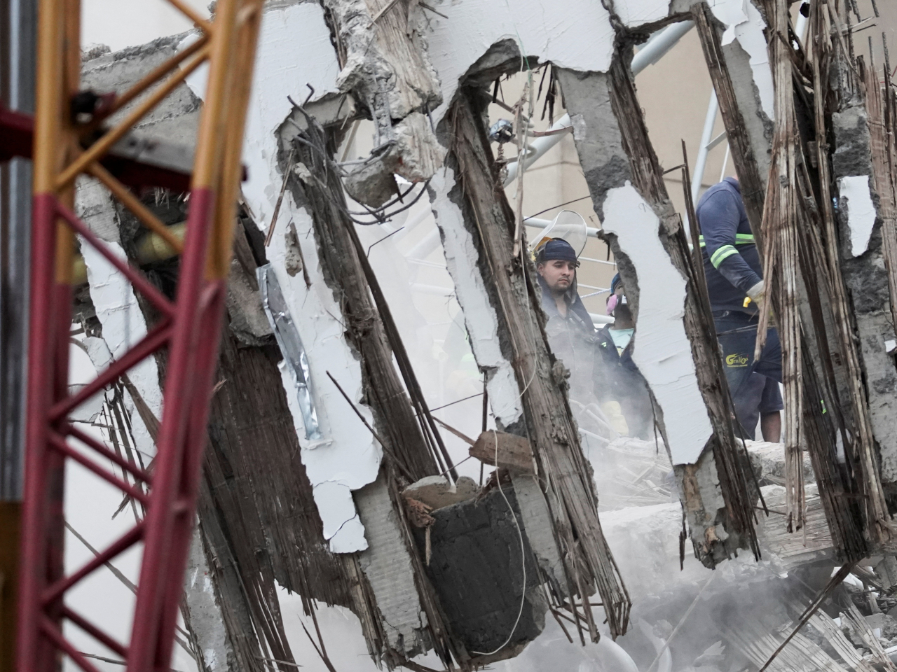 Crews have turned their attention from a search-and-rescue effort to debris removal at most sites. Photo: Reuters