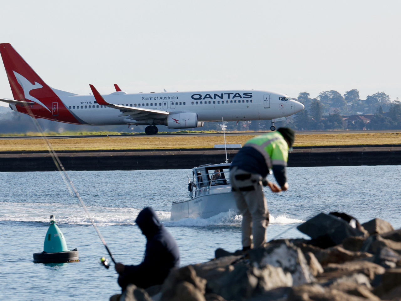 A Qantas jet was crossing the runway after a Virgin Australia 737 had been cleared for take-off. File photo: Reuters