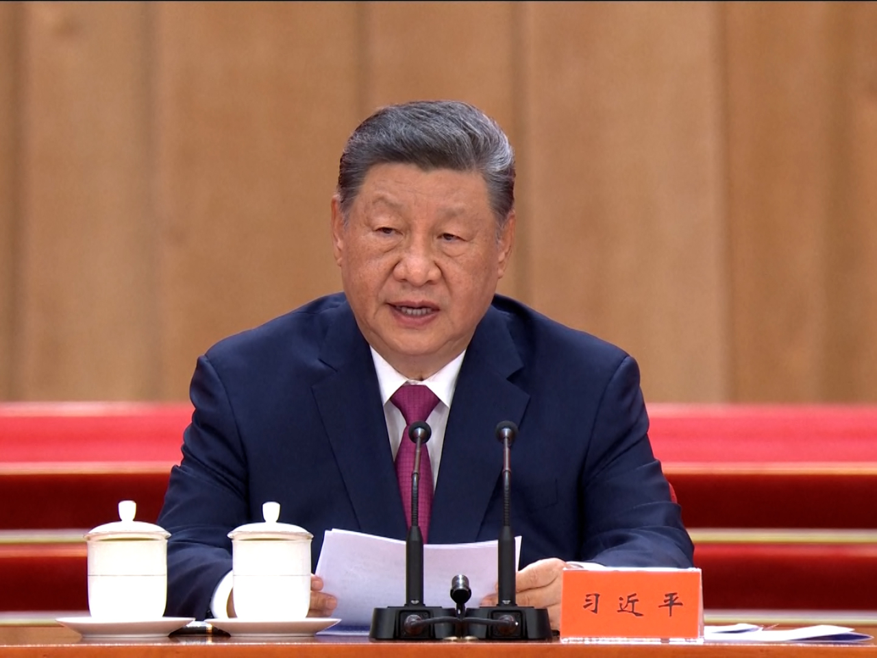 習近平說江澤民在任期間領導實現港澳回歸，推動兩岸達成「九二共識」。（央視圖片）
