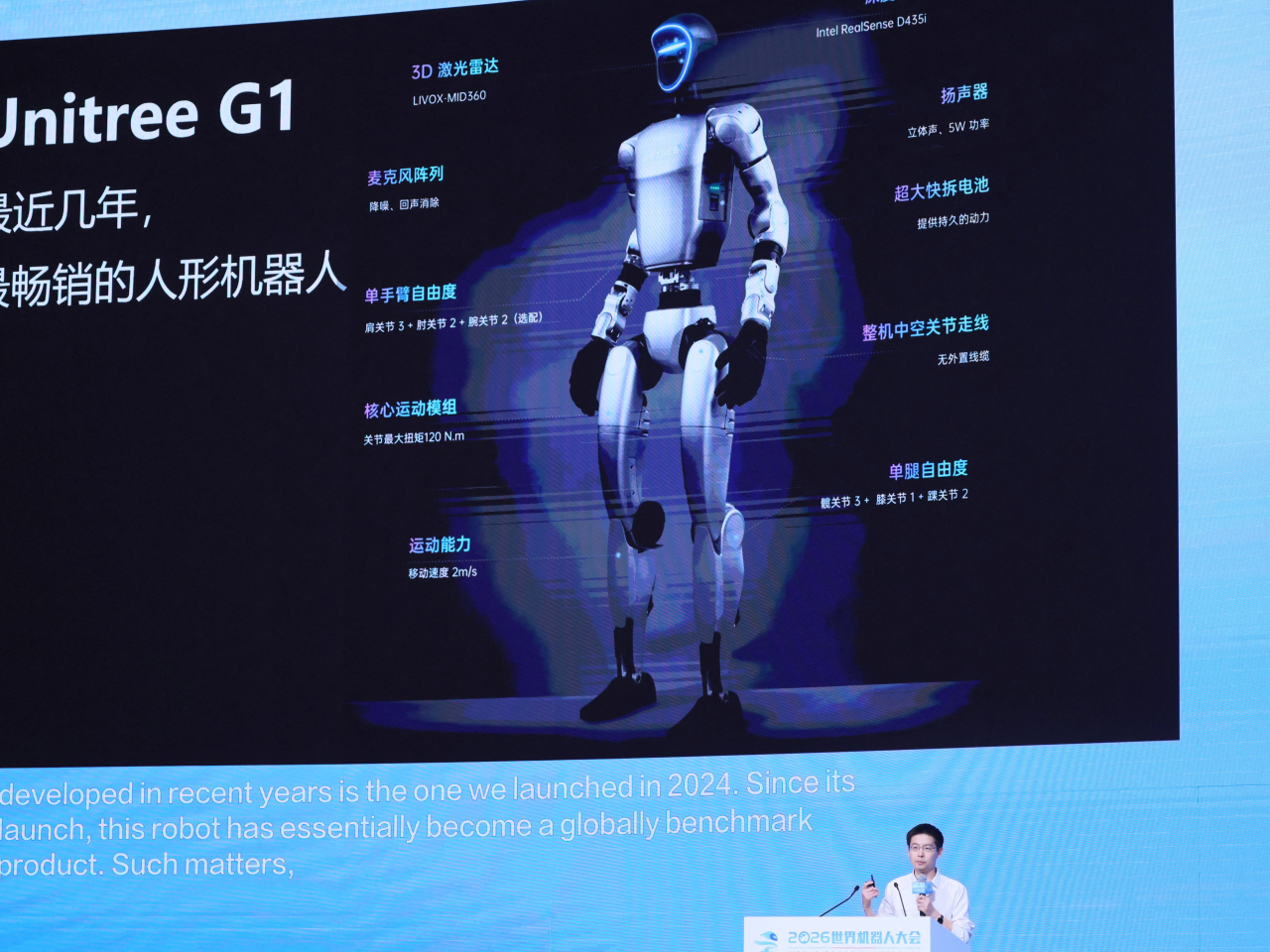 Wang Xingxing talks about the capabilities of Unitree's G1 humanoid at the 2026 World Robot Conference in Beijing. Photo: Reuters