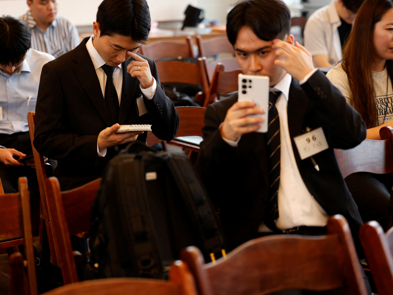 South Koreans prepare for interviews at a job fair in Seoul. File photo: Reuters