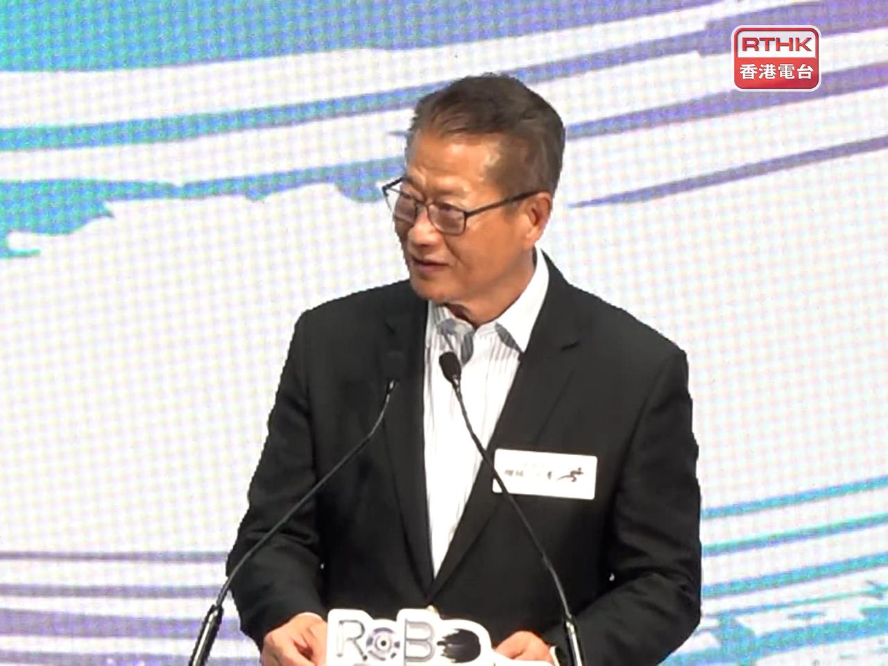 Paul Chan encouraged the competitors to keep imagining, keep getting their hands dirty and keep learning. Photo: RTHK