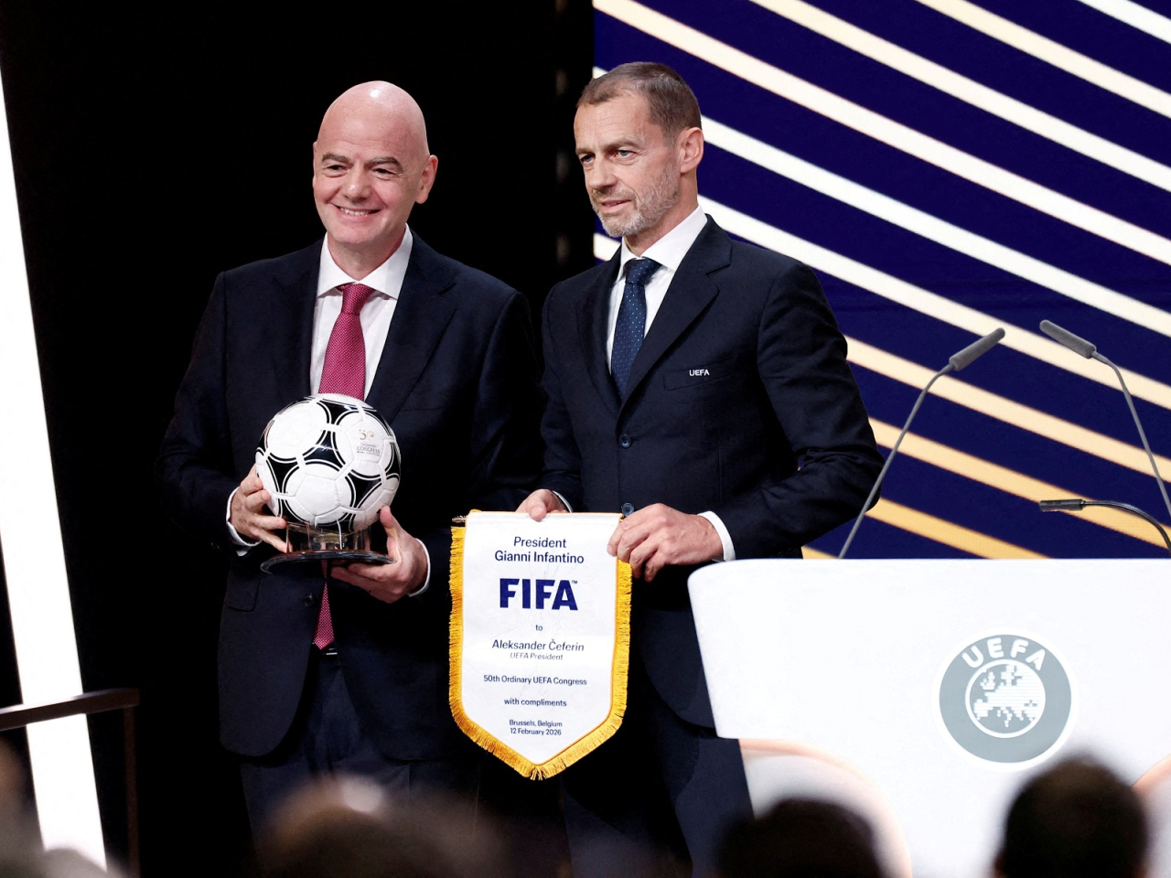 Uefa president Aleksander Ceferin (right) said while he's not after Gianni Infantino's position, the Fifa president needs to go. File photo: Reuters