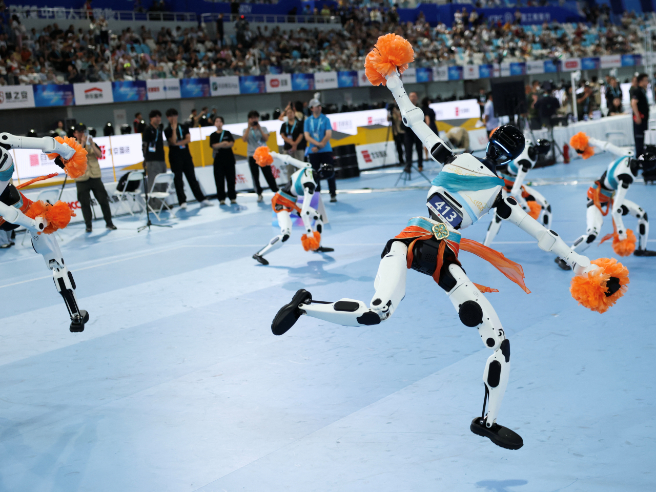 A humanoid robot team competes in a cheerleading contest at Beijing's 2026 World Humanoid Robot Games. Photo: Reuters